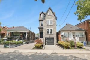 Front exterior view of a new modern 3-storey home in Caledonia-Fairbank, Toronto